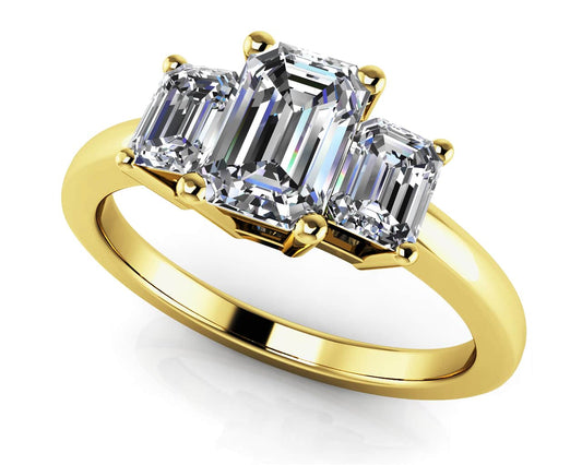 Elegant Three Stone Emerald Engagement Ring